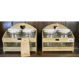 4 airtight jars in wooden crates