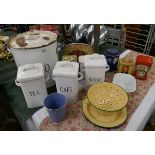 Collection of enamel kitchenalia and Coronation tins