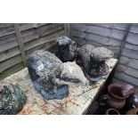 Stone garden ornaments - 2 otters & badger