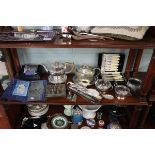 Shelf of metalware