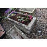 Stone trough with plants