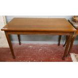 Mahogany side table on tapered square legs - Approx W: 114cm D: 61cm H: 74cm