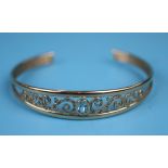 Gold blue topaz set bangle