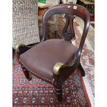 Early unusual campaign style chair