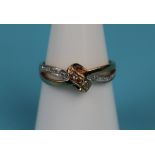 Gold diamond ring with unusual knot setting