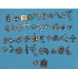 Large collection of white metal charms