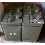 Six military oil cans