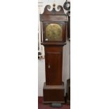 Long cased grandfather clock with brass face