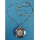 Silver clock pendant in good working order