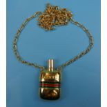 Perfume bottle pendant marked Gucci on chain