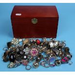 Large quantity of costume rings in wooden box