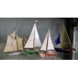 4 metal framed and stained glass sailing ships