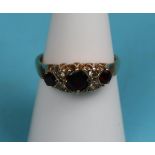 Gold garnet gypsy set ring