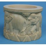 Ivory pot depicting elephants