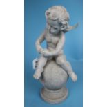 Cherub figure sat on orb