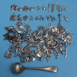 Large quantity of white metal pendants/charms etc