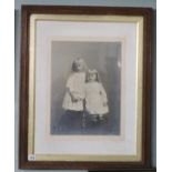 Early framed large photograph of 2 girls