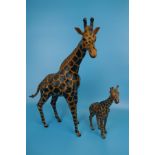 2 leather giraffe figures - Approx height of tallest: 47cm