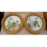 Pair of round oil on milk glass floral pictures