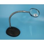 Vintage articulated magnifying glass on stand