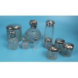 Collection of hallmarked silver topped bottles etc