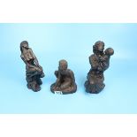 3 bronzed figures