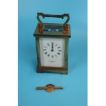 Bevelled glass carriage clock by Wellington with key