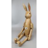 Wooden articulated rabbit figure