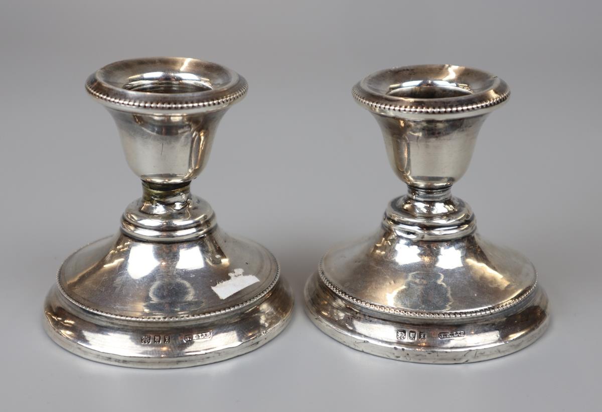 Pair of hallmarked silver candlesticks