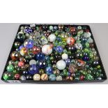 Tray full of vintage marbles