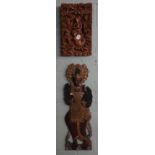 2 carved tribal plaques