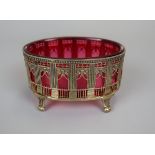 Hallmarked French silver gilt salt with cranberry glass liner