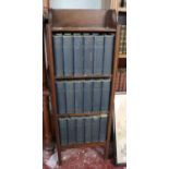 Collection of 18 Charles Dickens volumes in mahogany stand