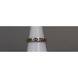 Gold channel set diamond ring