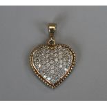 Gold diamond encrusted heart pendant