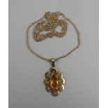 Gold citrine set pendant on gold chain