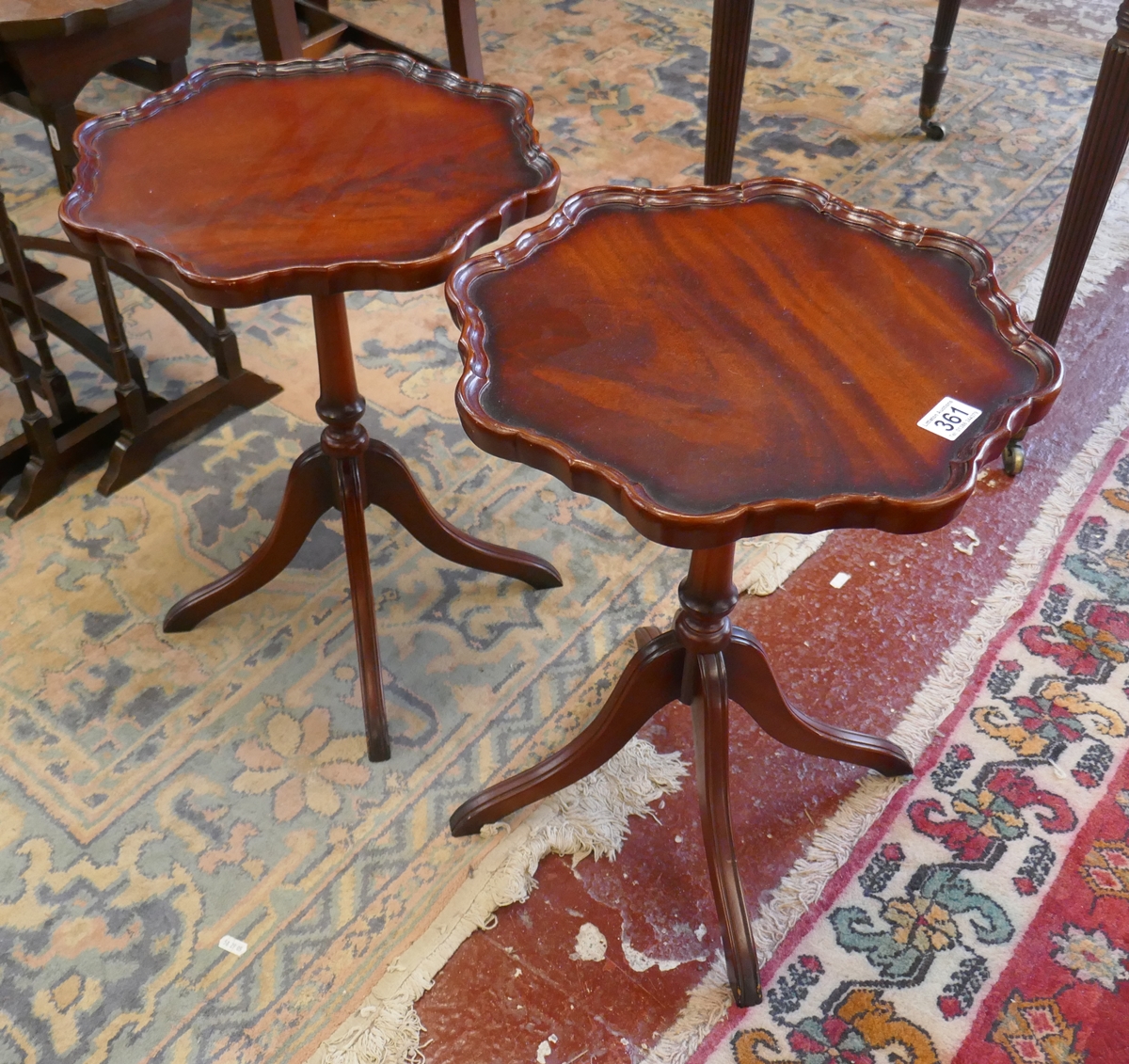 Pair of mahogany pie crust wine tables