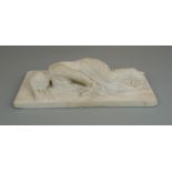 Carved marble figure of woman laying down