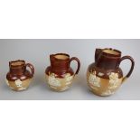 3 graduated Doulton Lambeth jugs