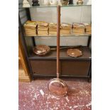 2 copper warming pans and a beaten copper tray