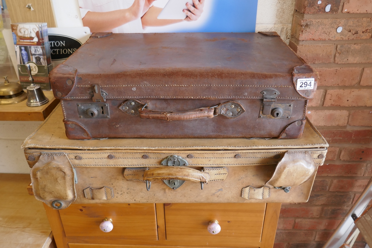 2 leather suitcases