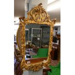 Mirror in ornate gilt frame