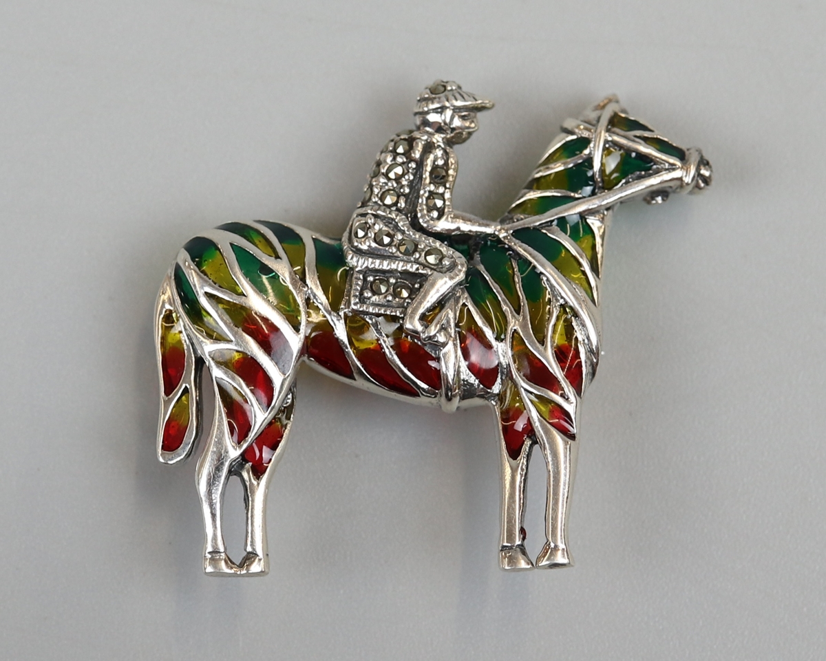 Silver enamel jockey brooch