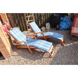 Pair of reclining teak steamer chairs with cushions - As new