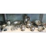 Shelf of metalware