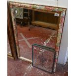 Mirror in floral frame together with an advertising mirror