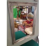 Bevelled glass mirror in silver frame