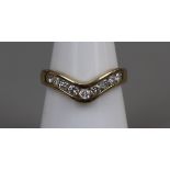 Gold channel set diamond wishbone ring (½ct total), size M½