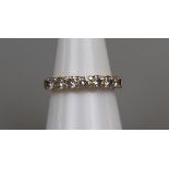 Fine 18ct gold 7 stone diamond ring, size M½