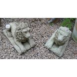 Pair of stone sitting lions